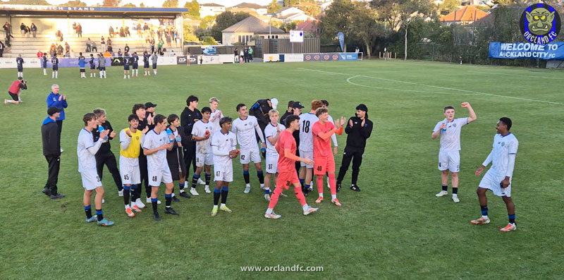 Auckland FC Reserves players celebrating their win against Auckland City FC in front of The Port - Orcland FC