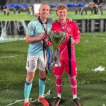 Michael Den Heijer and Blake Callinan with the OFC Pro League Trophy - Auckland FC OFC Pro League Champion 2026